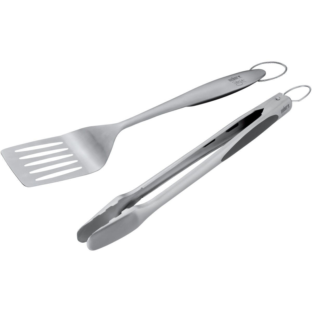Two-piece stainless steel BBQ tool set with soft rubber grip tongs and slotted spatula for grilling accessories collection