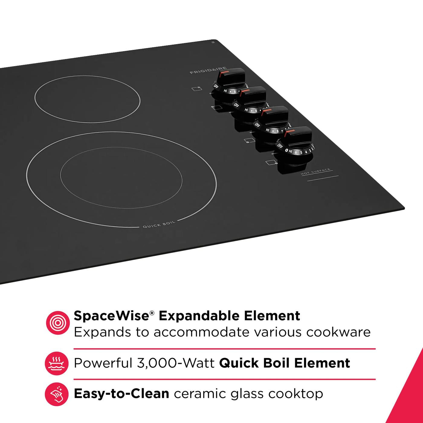 Black ceramic glass electric cooktop with expandable element and four control knobs from kitchen appliances collection