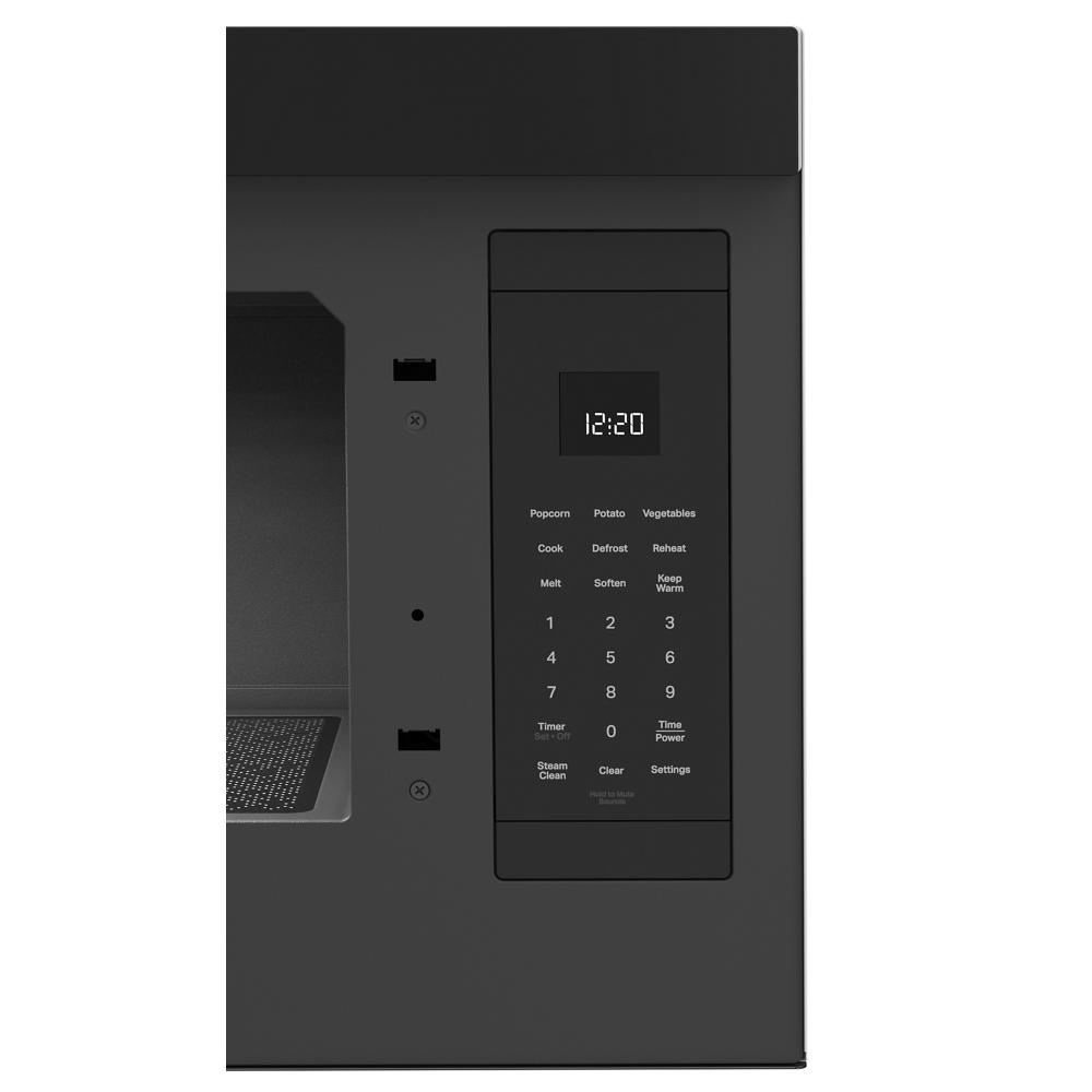 Black built-in microwave control panel with digital clock and touch button settings for cooking and defrosting functions