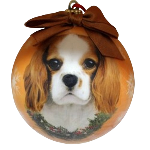 Christmas ball ornament featuring a King Charles Cavalier portrait with decorative wreath and brown bow accent under $50 collection
