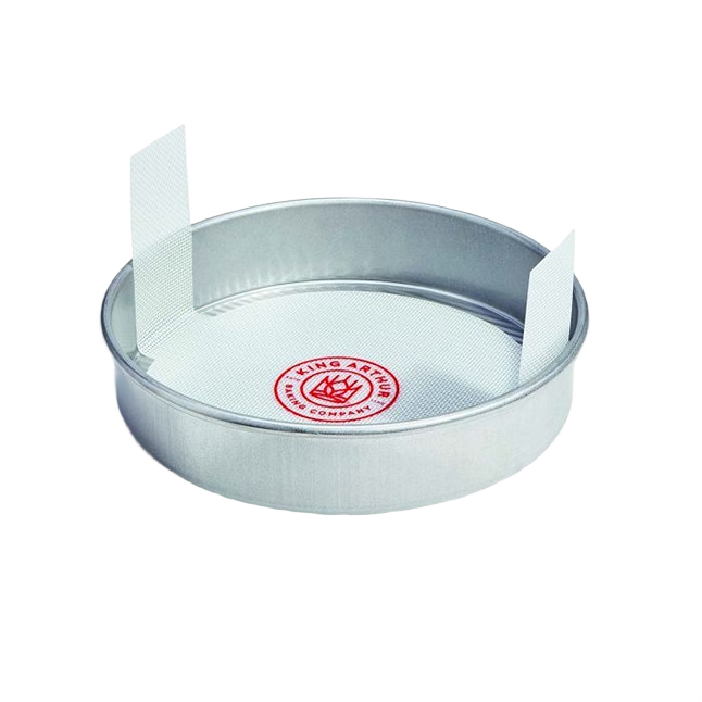 Round silicone loaf lifter with natural glass fibers and handles for easy bread release in kitchenware and bakeware collections