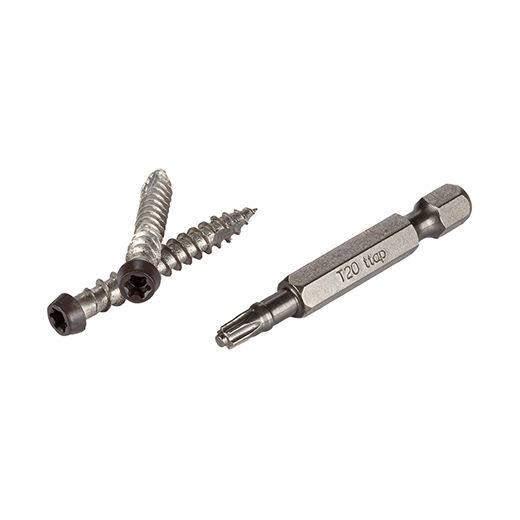 Three silver screws with dark brown heads next to a T20 star driver bit for deck accessories and home improvement.