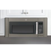 Over-the-range microwave with stainless steel filler kit installed in white kitchen cabinetry from Appliance Parts & Accessories collection