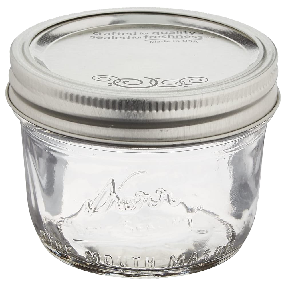 Clear glass half-pint wide-mouth canning jar with metal lid, suitable for kitchenware and home food preservation under $50