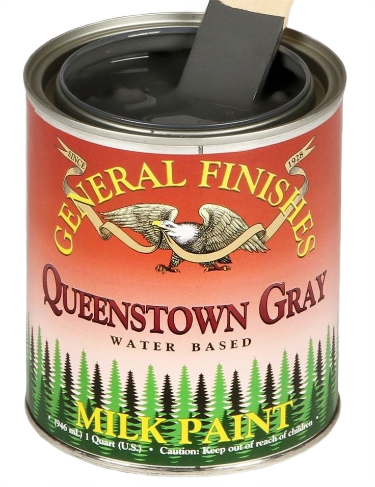 Open can of gray water-based milk paint with wood stir stick, featured in specialty paint and home improvement collections