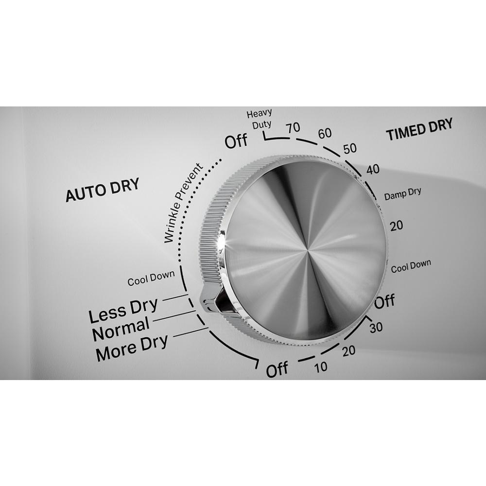 Close-up of stainless steel dryer control knob with cycle and temperature settings in dryers collection