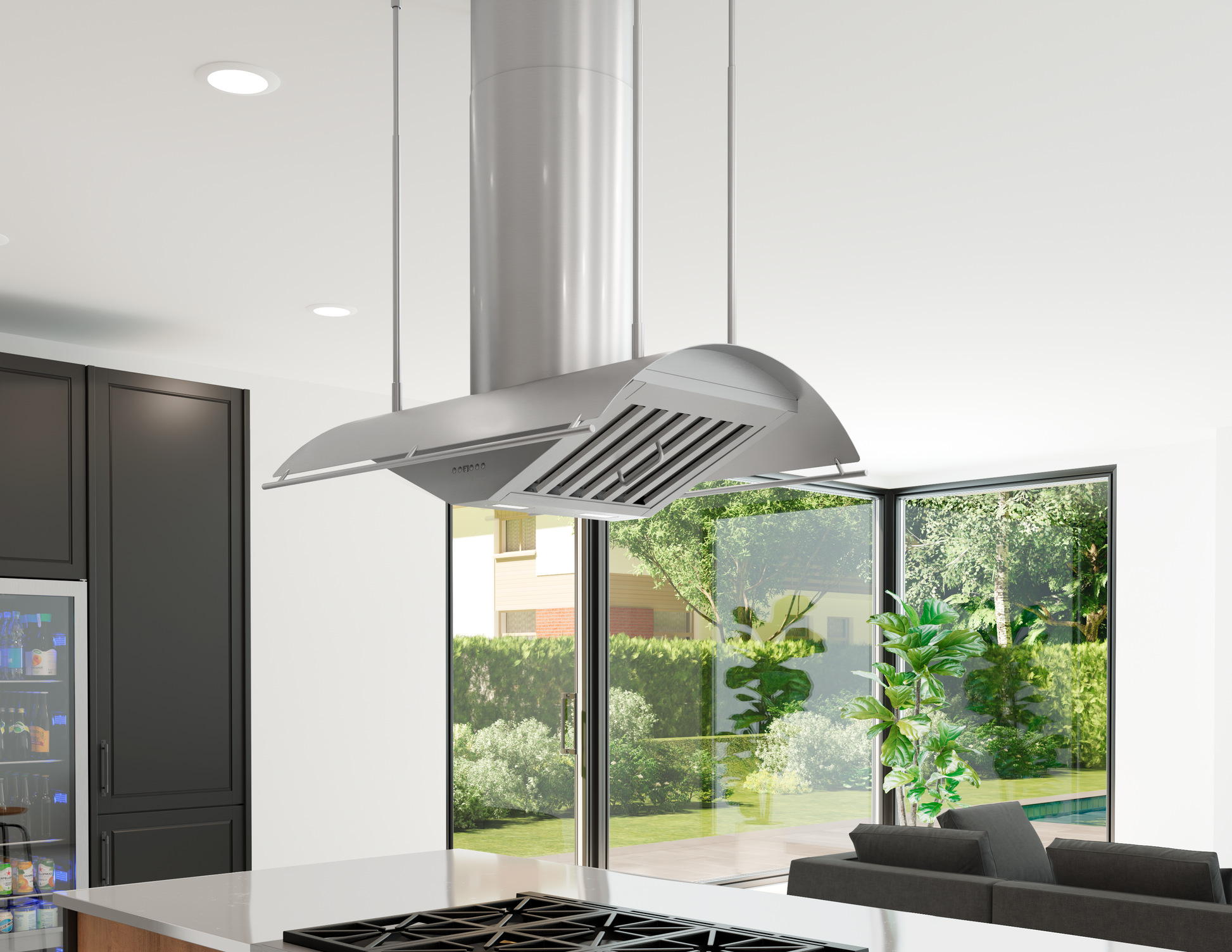Sleek stainless steel island hood with directional LED lighting suspended above kitchen stove in modern open space