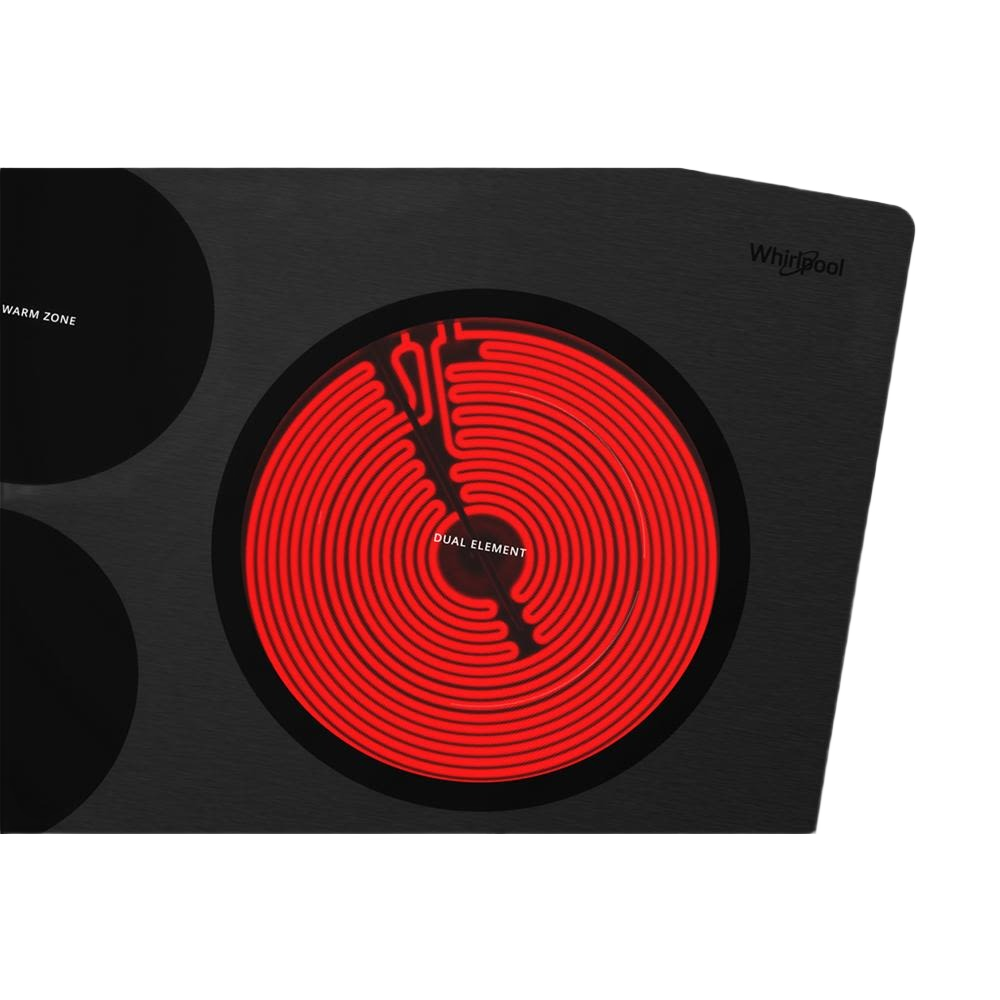 Black ceramic glass cooktop showing a glowing triple radiant element for cooking in kitchen appliances collection