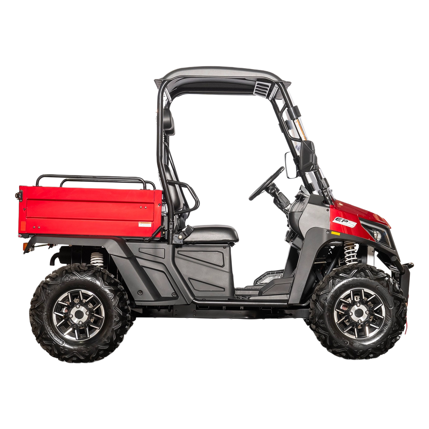 Red rugged utility vehicle with cargo bed, roll cage, and off-road tires designed for outdoor tasks and home improvement.