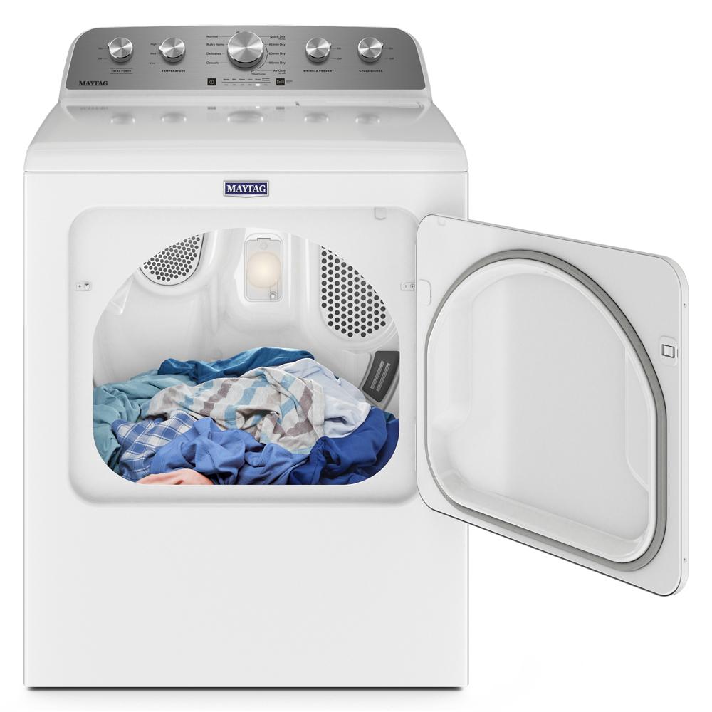 Open white top load electric dryer with assorted clothes inside and control panel visible in appliance collection