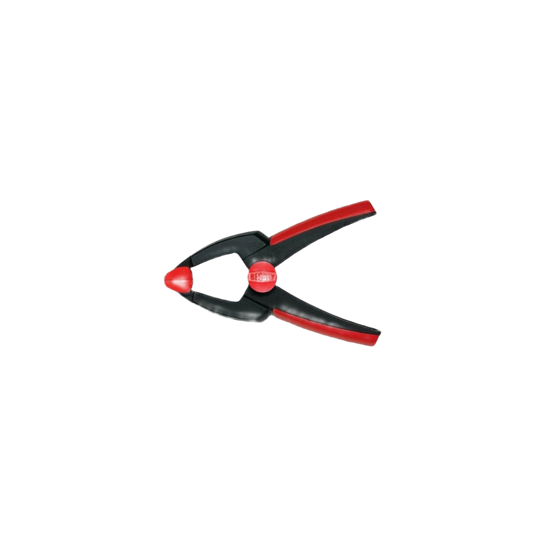 Black and red spring clamp with ergonomic handles for precise gripping in home improvement tasks