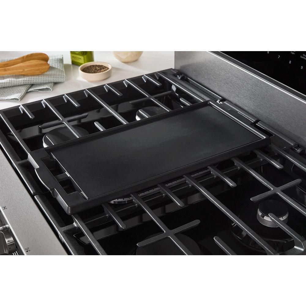 Black gas cooktop featuring a removable griddle between four burners from kitchen ranges and appliances collection
