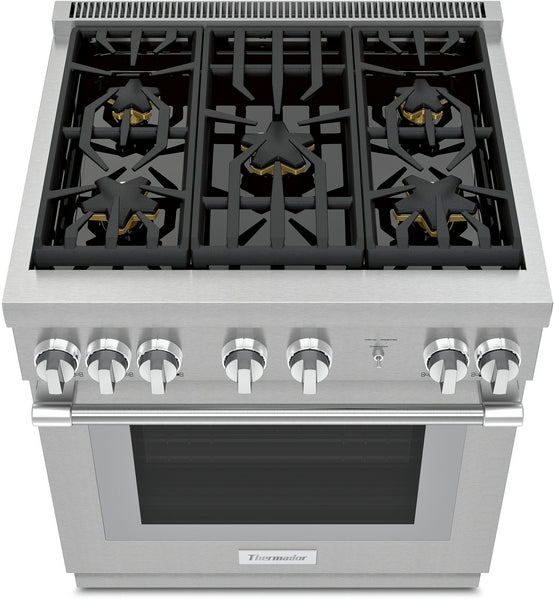 Stainless steel gas range with six star-shaped burners and seven control knobs in Thermador gas ranges collection