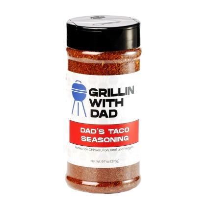 Clear plastic bottle of Grillin with Dad taco seasoning rub for grilling in BBQ and outdoor living collections under $50
