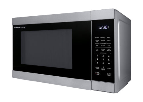 Compact silver and black countertop microwave oven with digital display and touchpad controls from kitchen appliances collection
