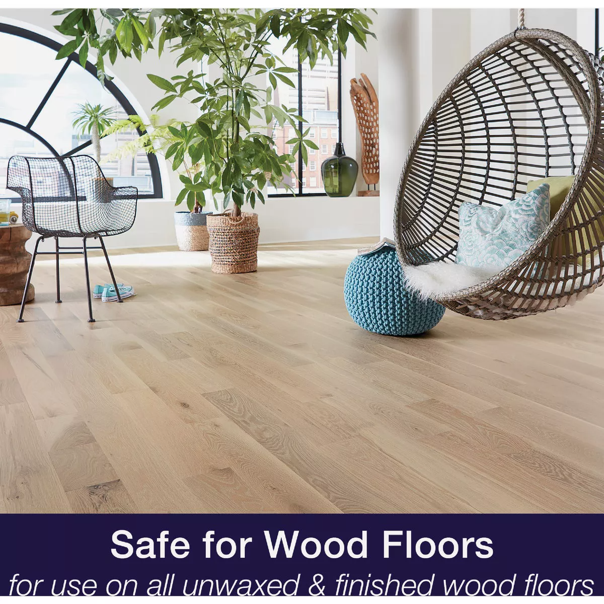 Bright modern living space showcasing clean natural hardwood floors safe for finished wood in home improvement setting