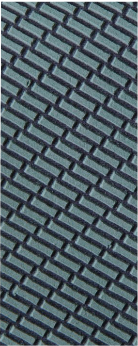 Close-up of textured abrasive surface on a sanding belt for tools and home improvement use