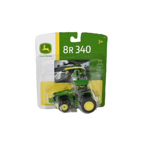 Green toy tractor model with triple rear tires in clear blister pack for Vehicles & Remote Controlled Toys collection