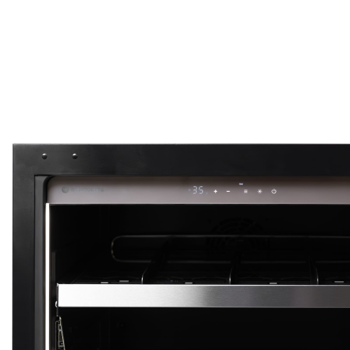 Close-up of digital temperature control panel and stainless steel shelf inside built-in under counter beverage center in kitchenware collections