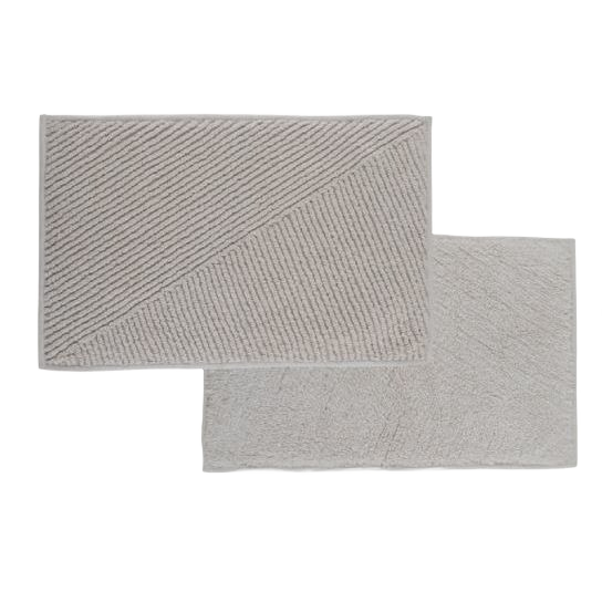 Reversible natural-colored bath mat with plush texture and mid-century design for bathroom safety and comfort under $50 collections