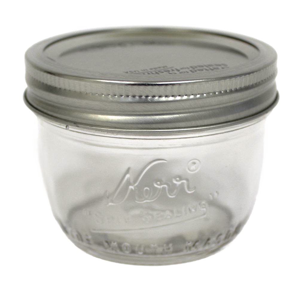 Clear wide-mouth half-pint glass canning jar with metal lid, ideal for kitchenware and food preservation tasks under $50.
