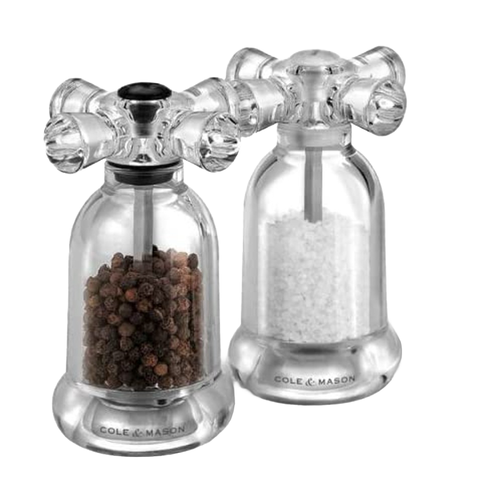 Clear acrylic salt and pepper mills with cross-handle tops filled with coarse salt and black pepper for Kitchenware collections