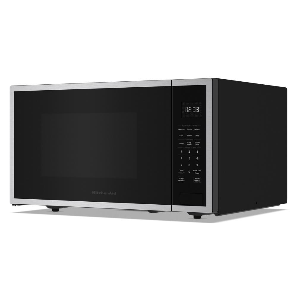 Sleek countertop microwave with stainless steel trim, digital display, and touch control panel from KitchenAid collection