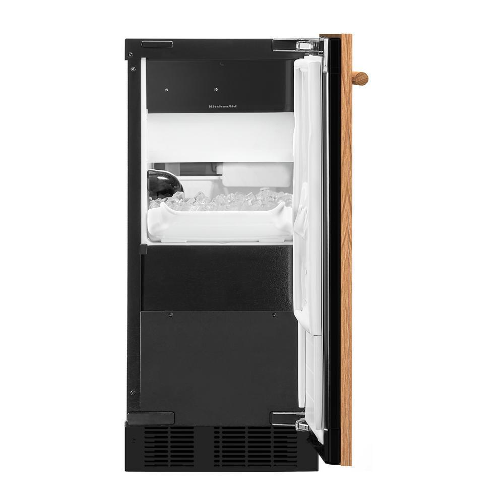 15" panel-ready automatic ice maker with custom wood overlay door open, showing clear ice production interior