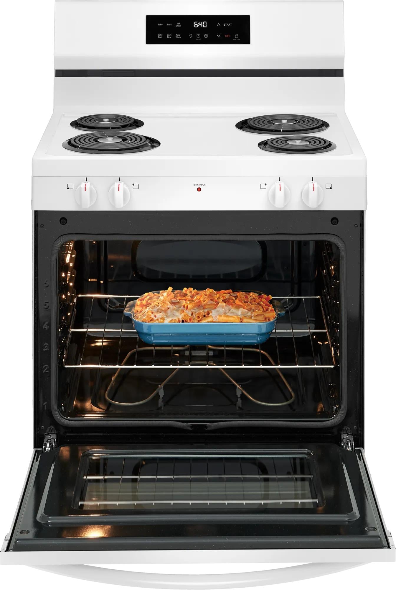 White electric range with four coil burners and casserole baking inside open oven in kitchen appliance collection