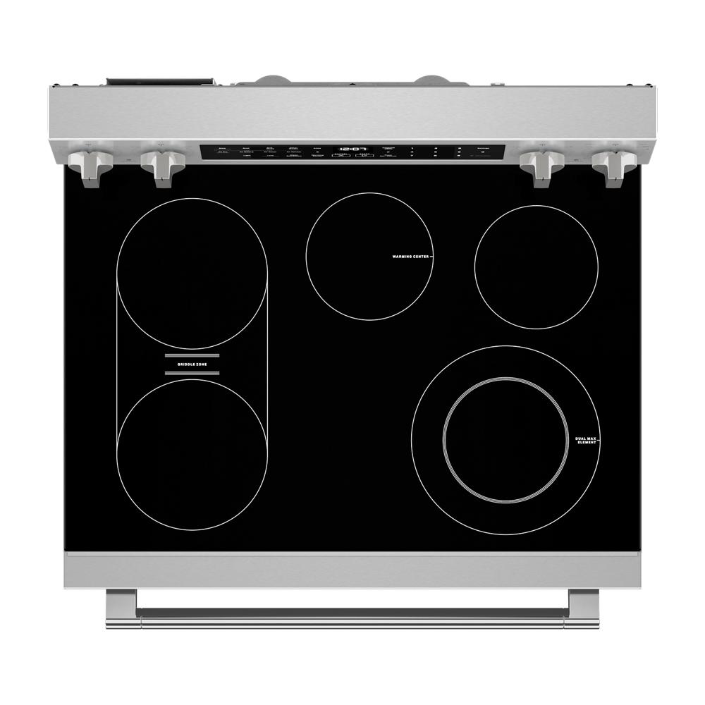 Electric range cooktop with five burners, stainless steel trim, control knobs, and touch control panel in kitchen appliances collection