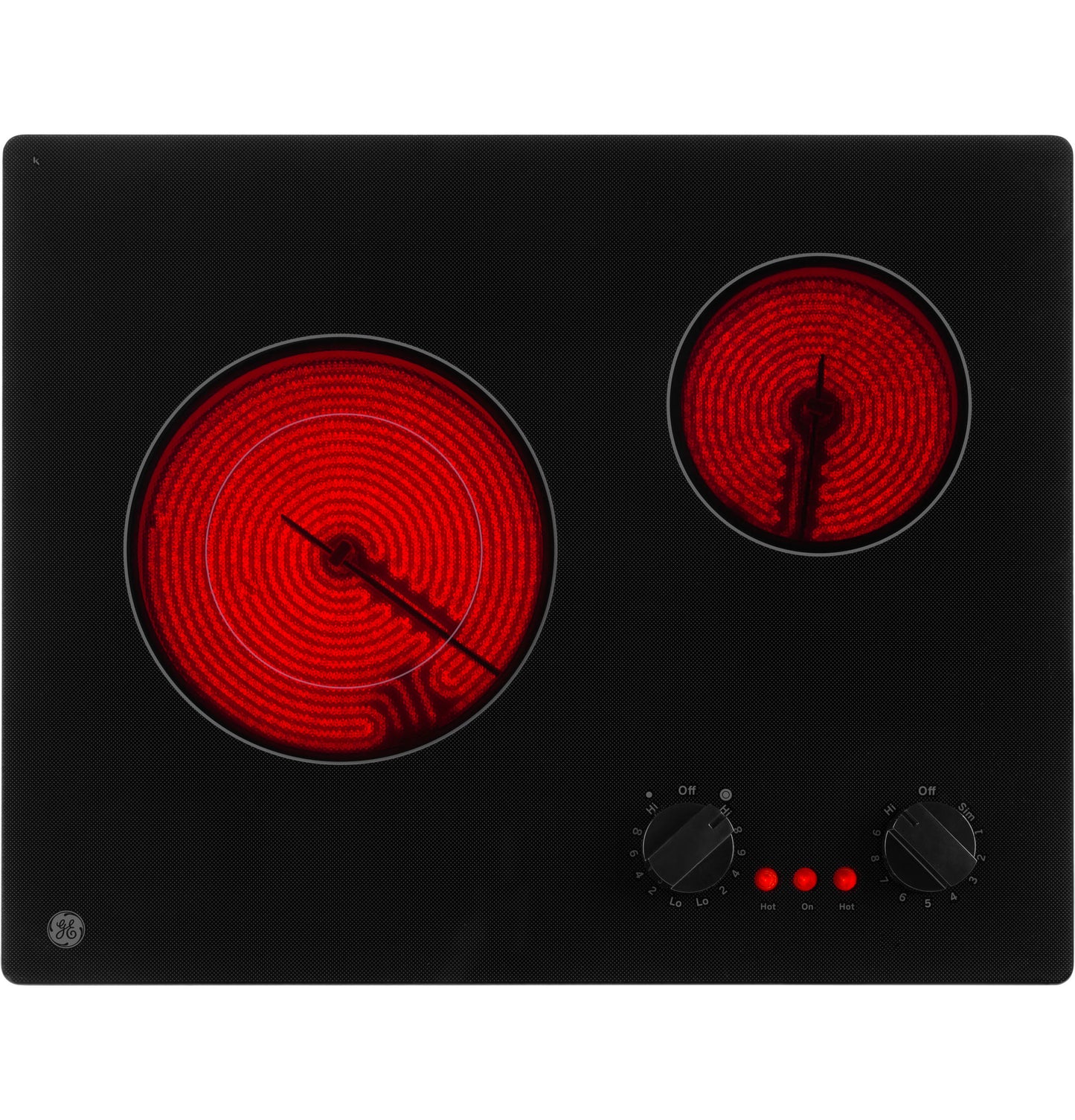 Black electric radiant cooktop with two glowing burners and rotary control knobs in kitchen appliances collection