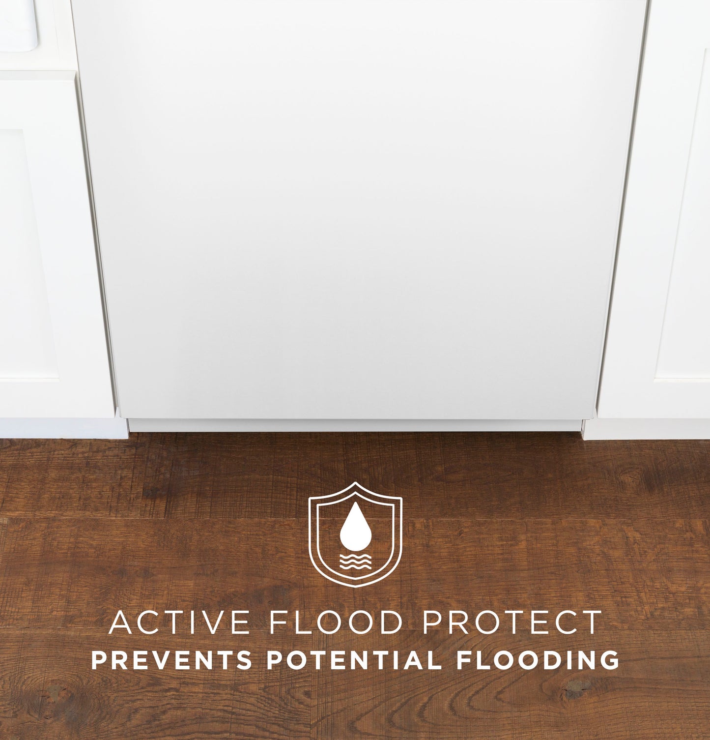 Close-up of white dishwasher bottom panel with active flood protect feature text over dark wood floor in modern kitchen