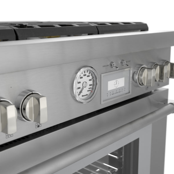 Close-up of stainless steel control panel and knobs with pressure gauge on dual fuel professional range from Kitchen & Kitchenware collection