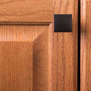 Oil rubbed bronze square knob on wood cabinet door for hardware and furniture accessories under $50 collection