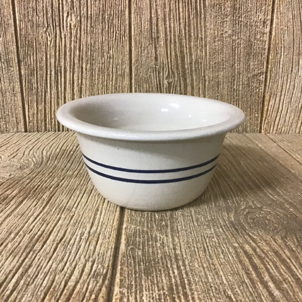 White stoneware bowl with two blue stripes, designed for serving in kitchenware and tableware collections under $50
