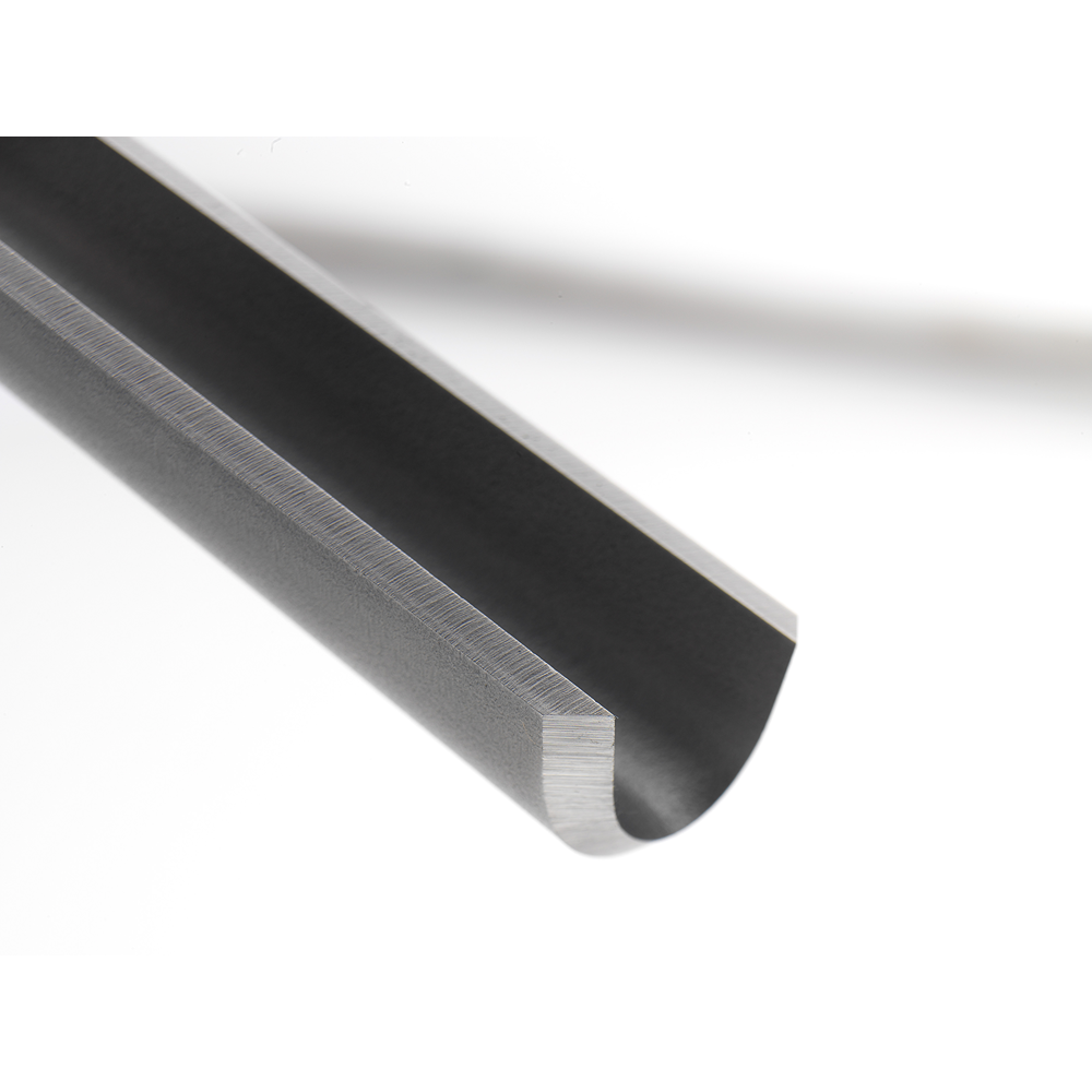 Close-up of a high-speed steel roughing gouge blade with sharp beveled edge for woodworking and home improvement tasks