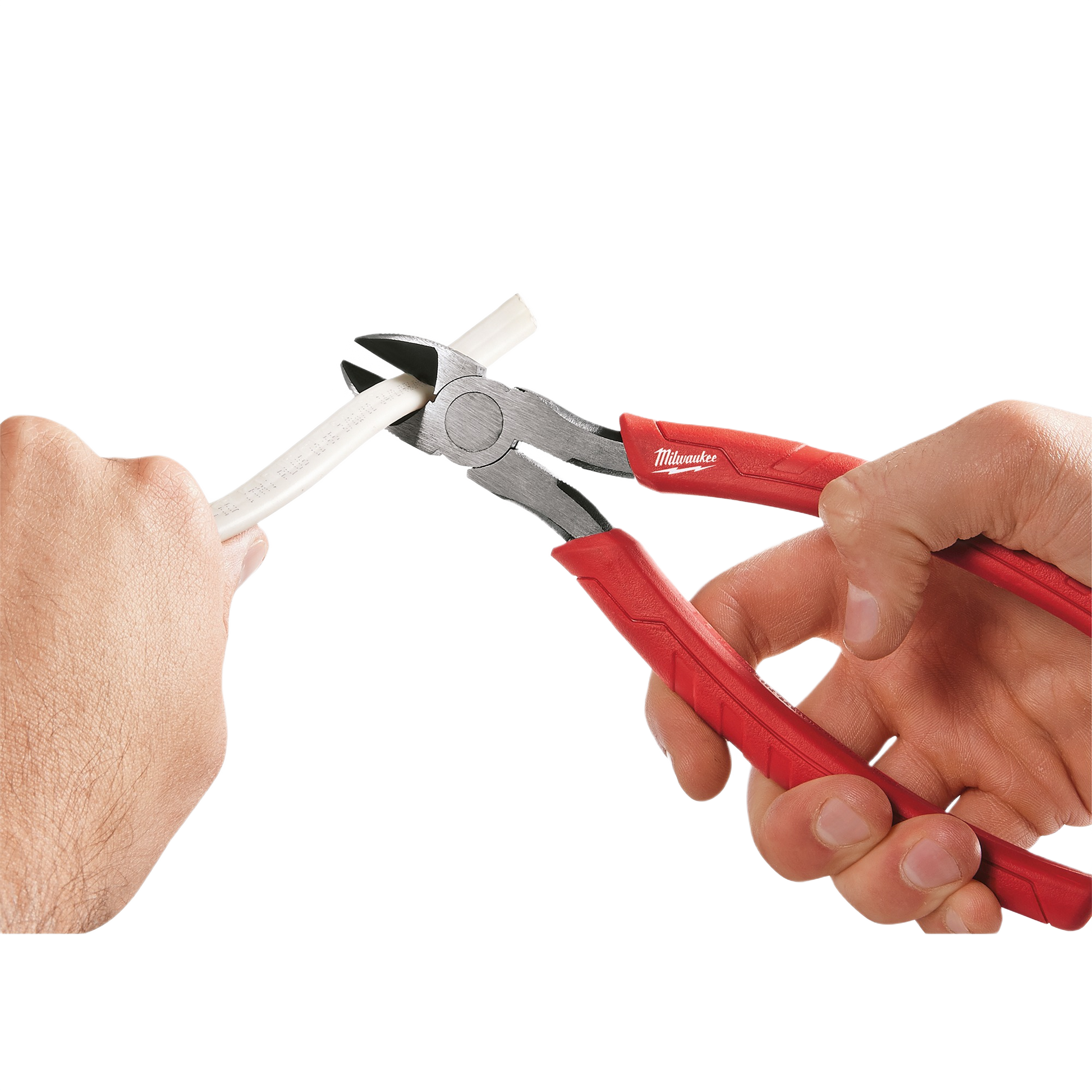 Red-handled comfort grip diagonal cutting pliers trimming a thick white cable for home improvement tasks