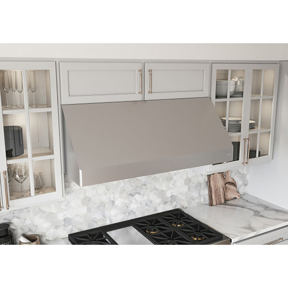 Contemporary stainless steel canopy hood with clean lines installed above black gas cooktop in kitchen appliances collection