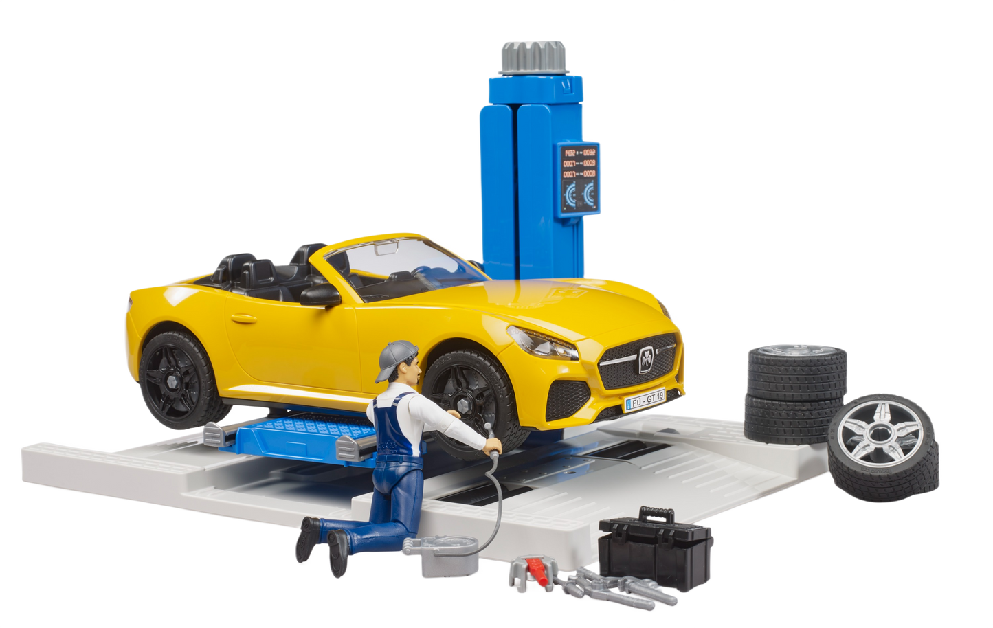 Yellow toy convertible car on blue service lift with mechanic figure, tires, and toolbox in car repair playset