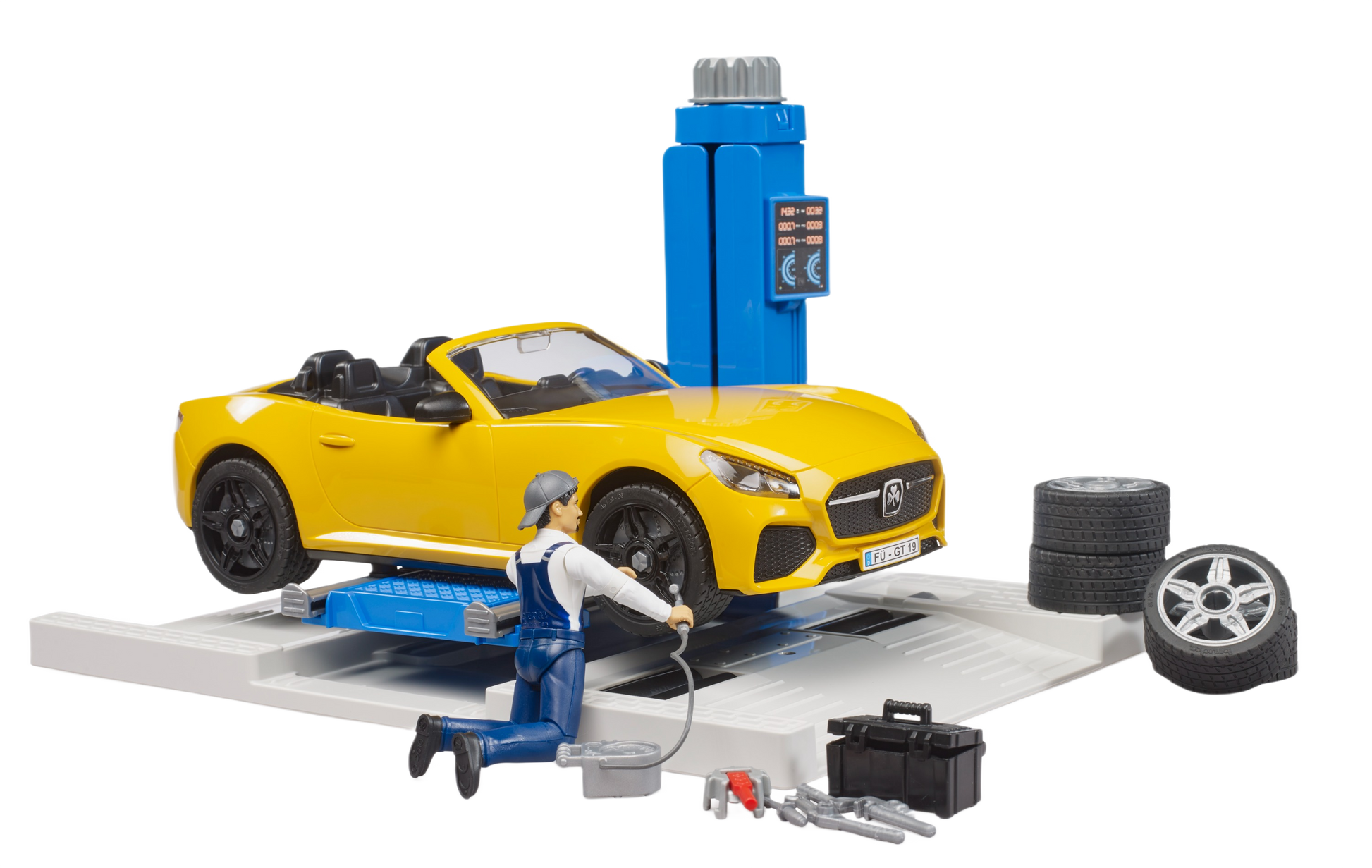 Yellow toy convertible car on blue service lift with mechanic figure, tires, and toolbox in car repair playset