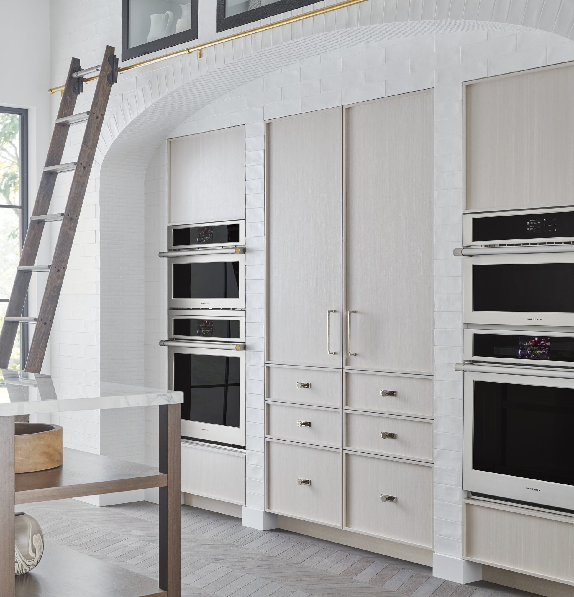 Modern kitchen with multiple built-in wall ovens and sleek cabinetry in single wall ovens and appliances collection