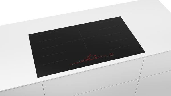 36-inch black induction cooktop with five cooking zones and touch controls in Bosch kitchen appliances collection