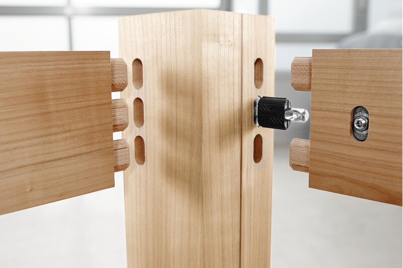 Wooden boards joined with Festool Domino Connector split anchor in a woodworking project setup for home improvement tools