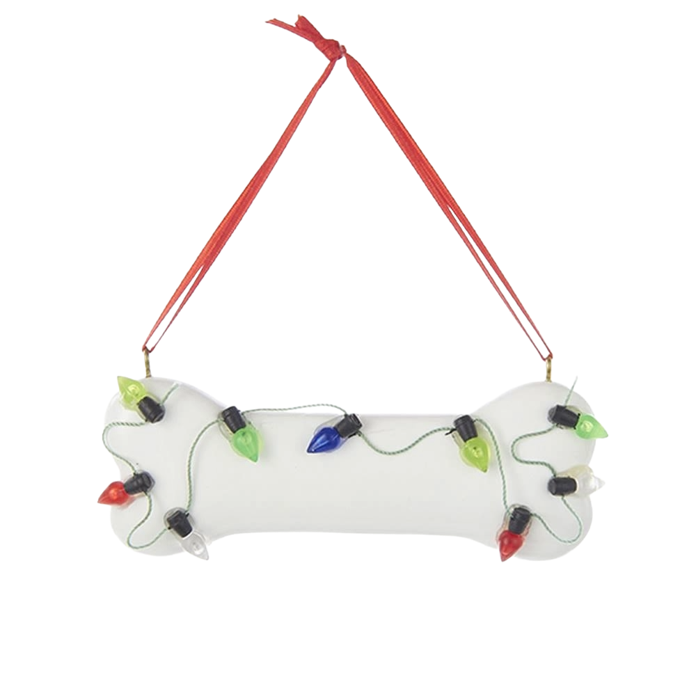 White dog bone-shaped ornament decorated with colorful holiday lights and red hanging ribbon for Christmas décor.