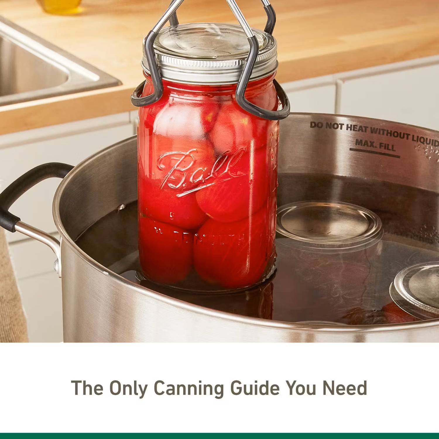 Glass jar filled with tomatoes being processed in hot water bath, kitchenware and under $50 collection