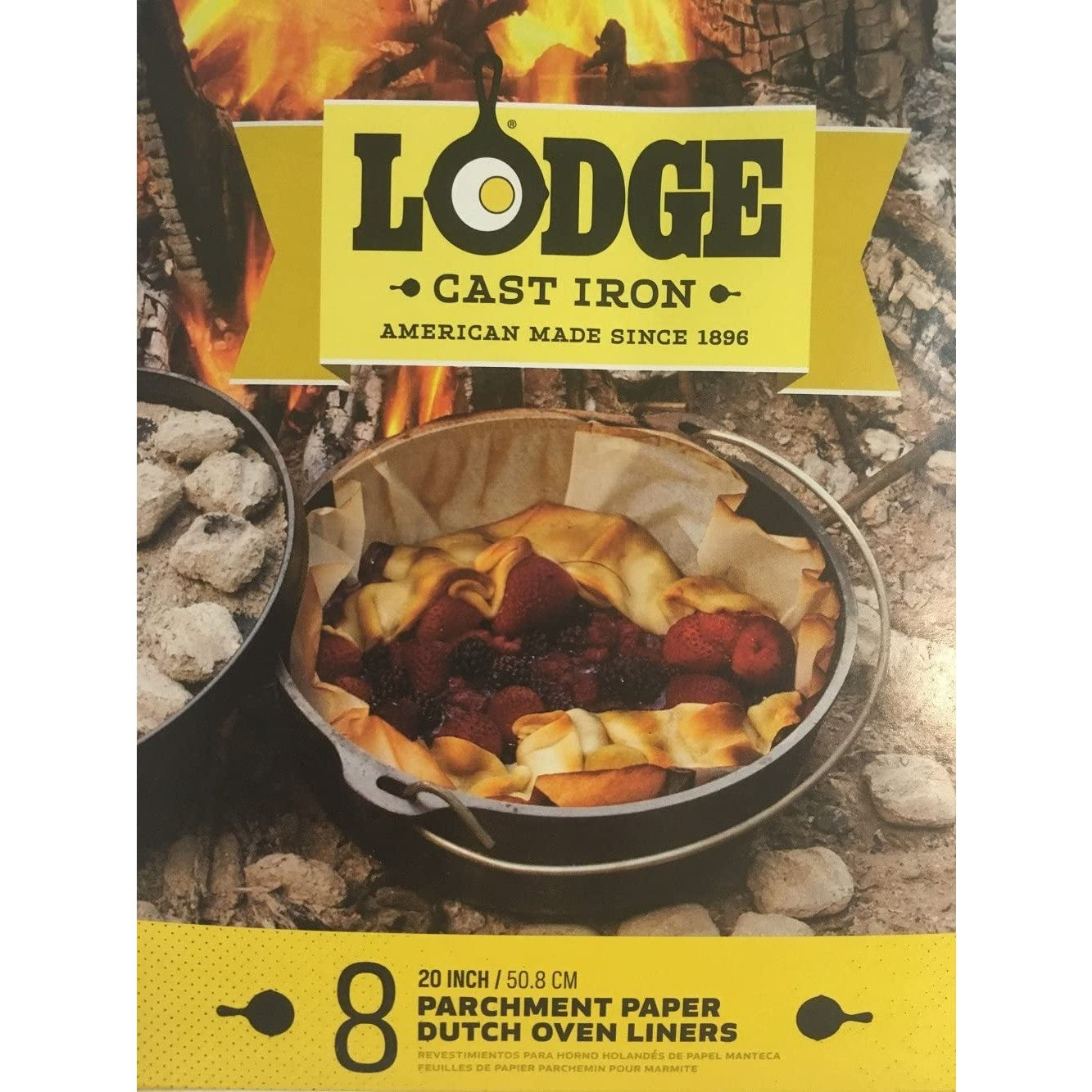 Dutch oven lined with parchment paper baking mixed berries over a campfire for outdoor cooking under $50 collection