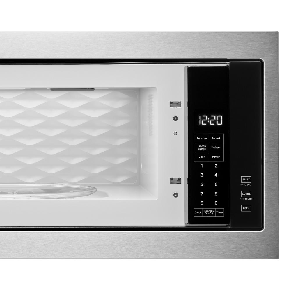 Built-in stainless steel microwave oven with digital display and touchpad controls in microwave parts collection