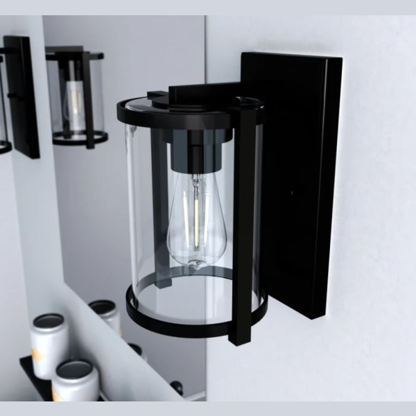 Matte black and clear glass wall light with visible filament bulb for bathroom or vanity accent lighting