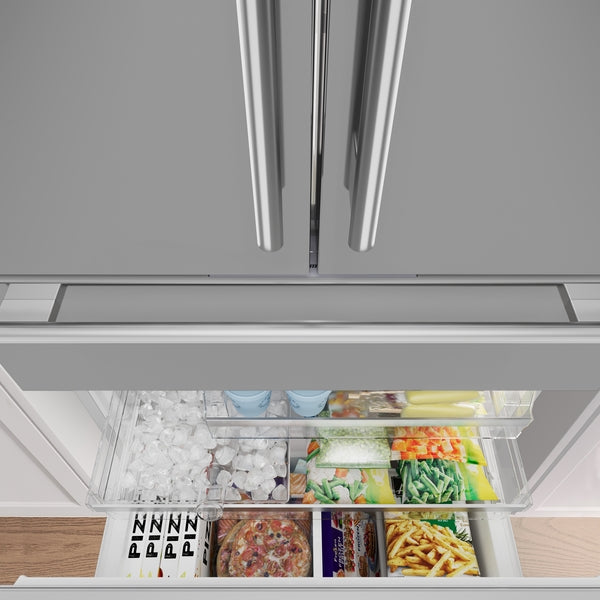 Open freezer drawer with organized frozen foods inside stainless steel French door refrigerator from Thermador Appliances collection