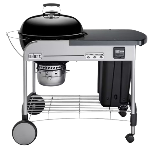 Black kettle charcoal grill with side prep table and lower storage rack in outdoor grilling and lawn garden settings